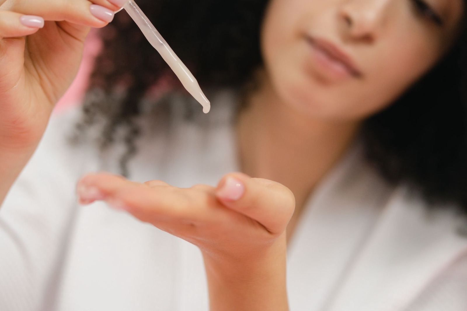 Serum being applied during a professional facial